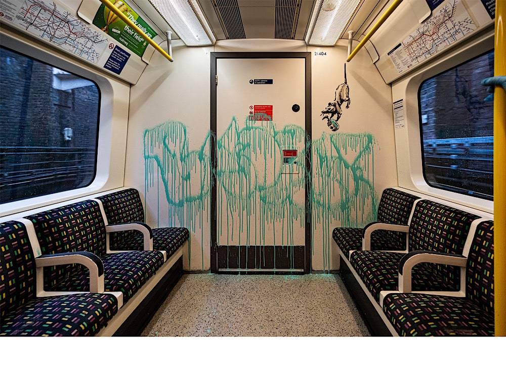 Banksy wirbt für Masken in Londoner U-Bahn